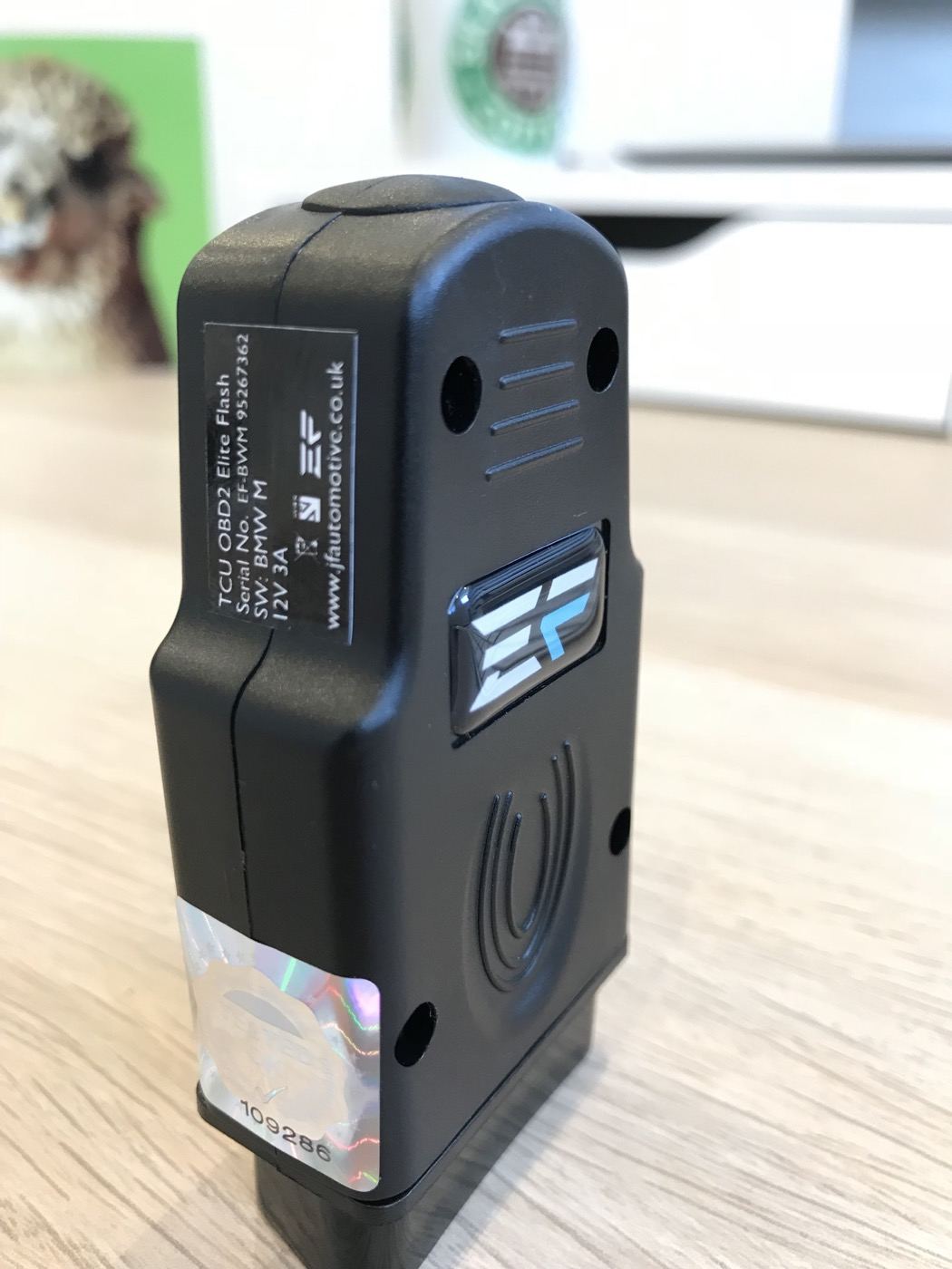 The Elite Flash tool, showing its serial number label